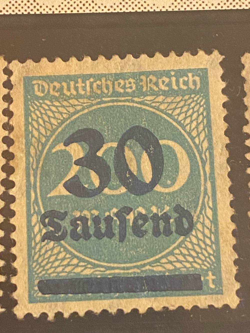 1923 German hyperinflation stamp from the Deutsches Reich.It features a "30 Taus